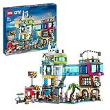 LEGO 60380 City Stadtzentrum Set, Modellbausatz, Spielzeug mit Spielzeugläden wie Friseur, Tierarzt, Hotel und Dachdisco mit Minifiguren und Straßenplatten, Geschenk zum Geburtstag für Kinder